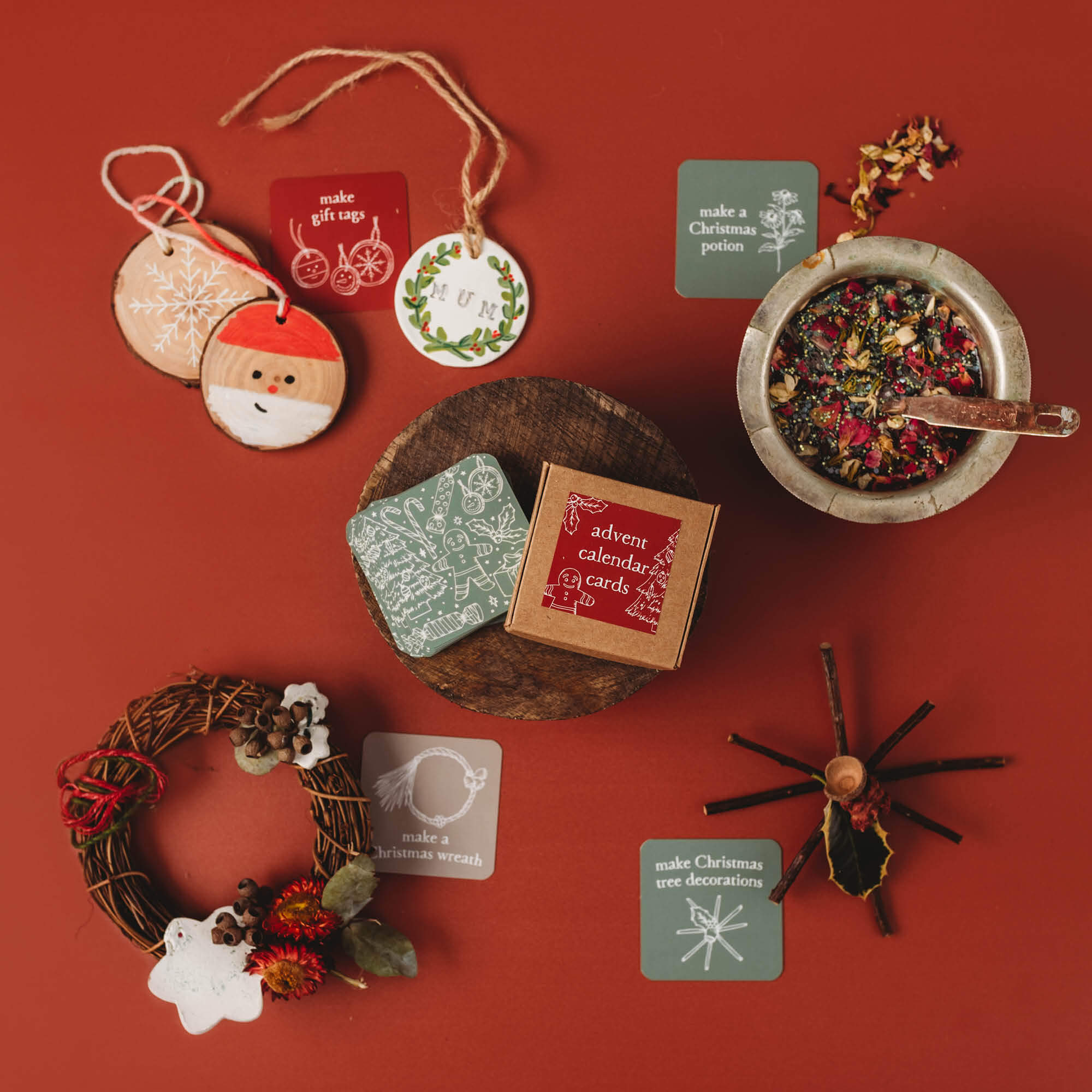 Advent Calendar Cards made in Australia by Your Wild Books to encourage creativity and family connection. Several cards showing with decorations from nature.