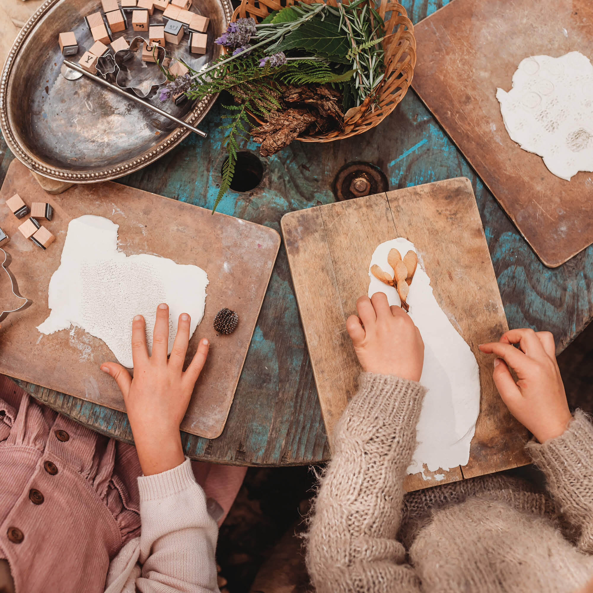 decorating air dry clay with nature making patterns with natural materials easter decorations from Your Wild Books