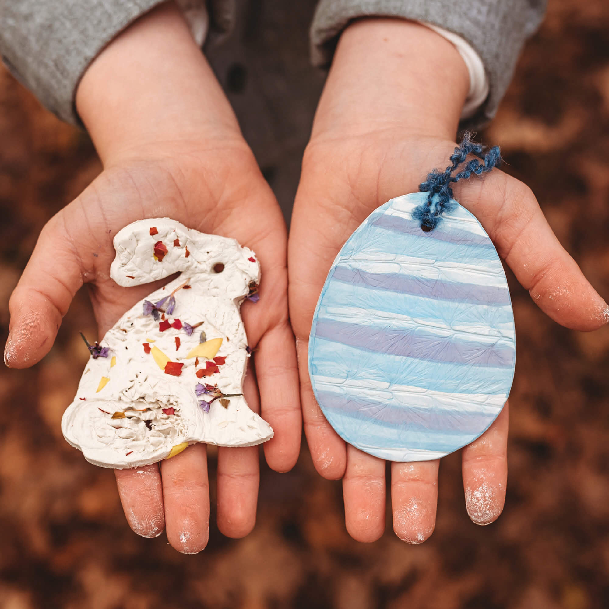 air dry clay white natural gift tags with names and coloured with watercolour paint easter decorations from Your Wild Books