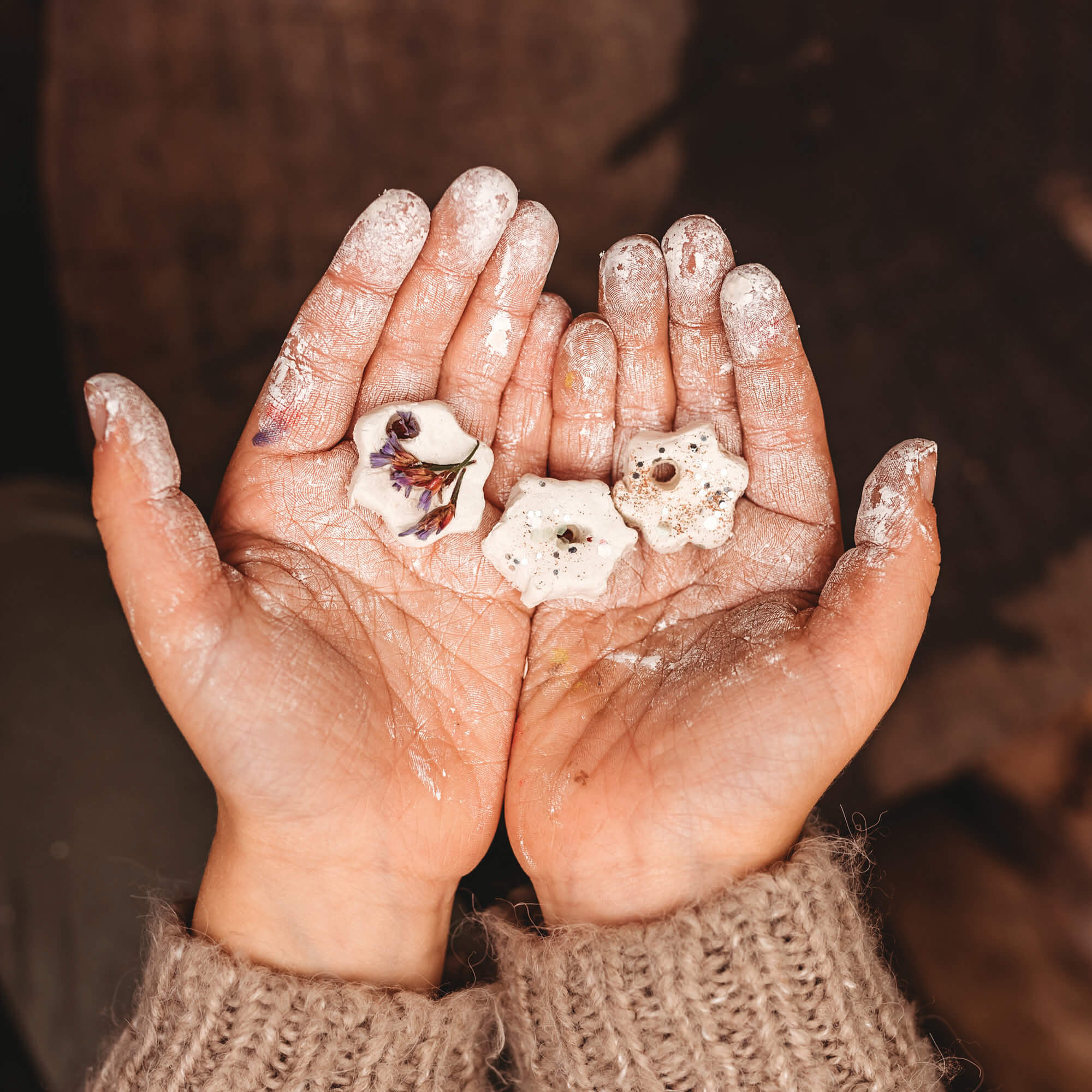 air dry clay white natural small stars decorated with flower petals for Christmas decoration from Your Wild Books