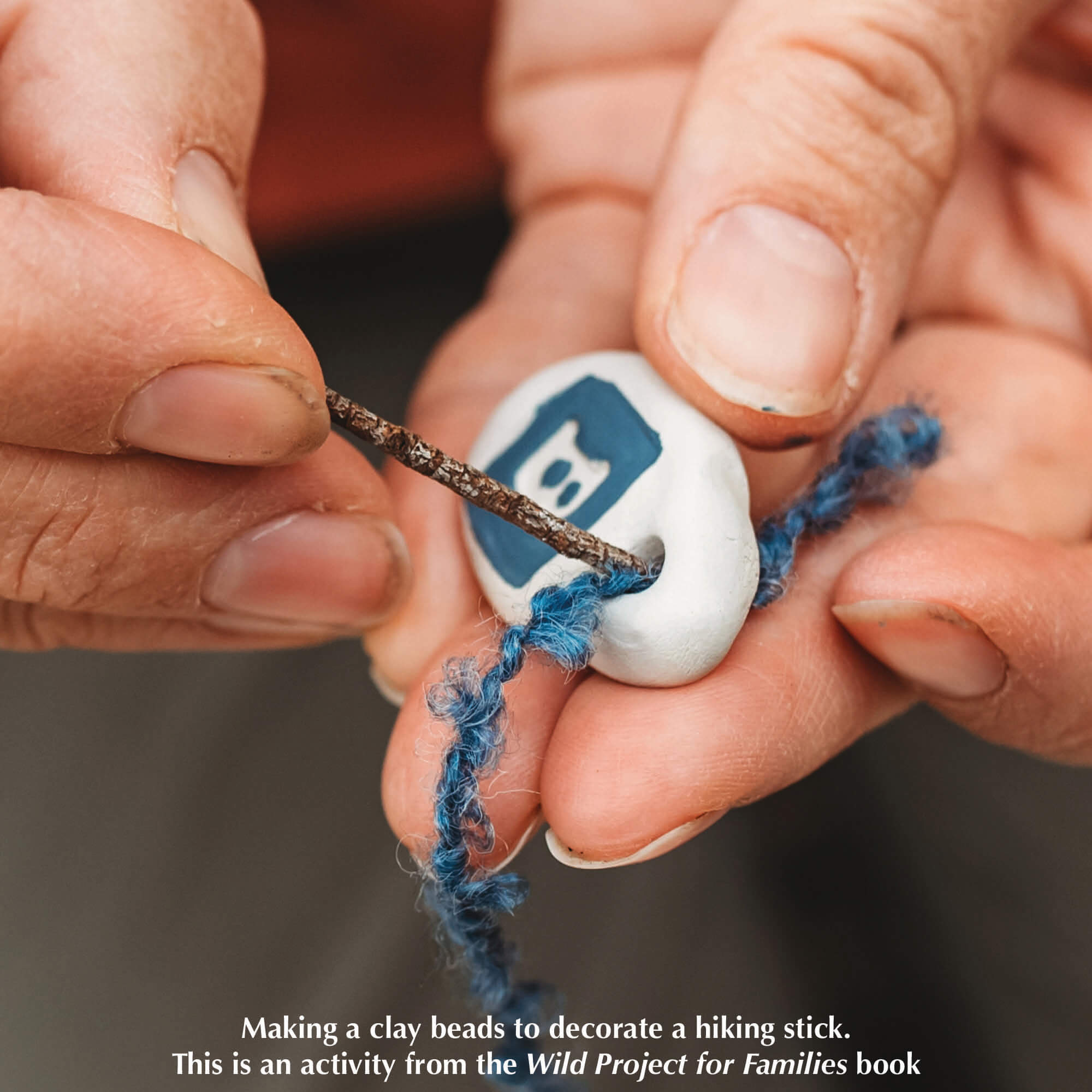 small bead made with air dry clay and decorated with paint pens for nature craft from Your Wild Books