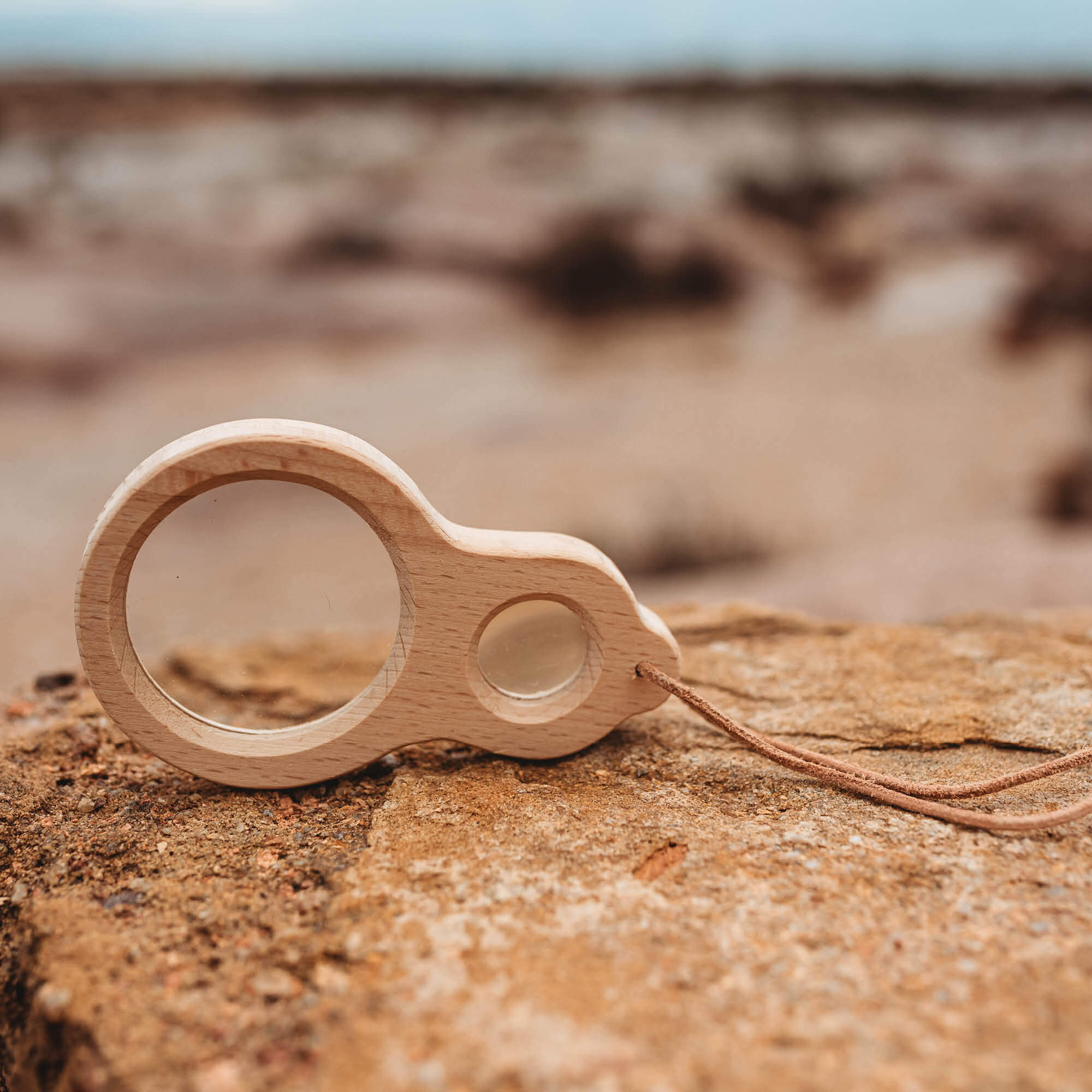 Kikkerland dual magnifier wooden magnifying glass with two lenses for exploring nature and play at the beach from Your Wild Books