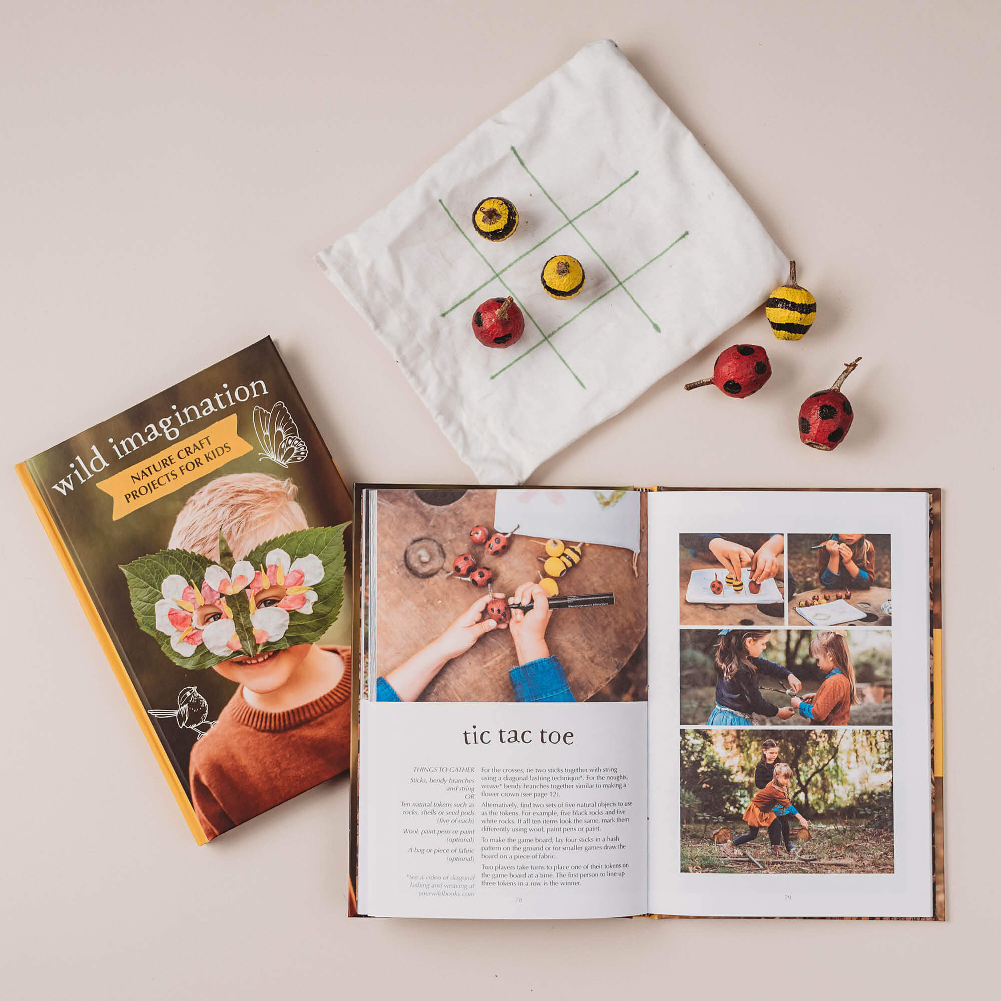 Pages showing step by step instructions for how to make tic tac toe game using nature and gumnuts from Wild Imagination, nature craft projects for kids book, made in Australia by Your Wild Books.