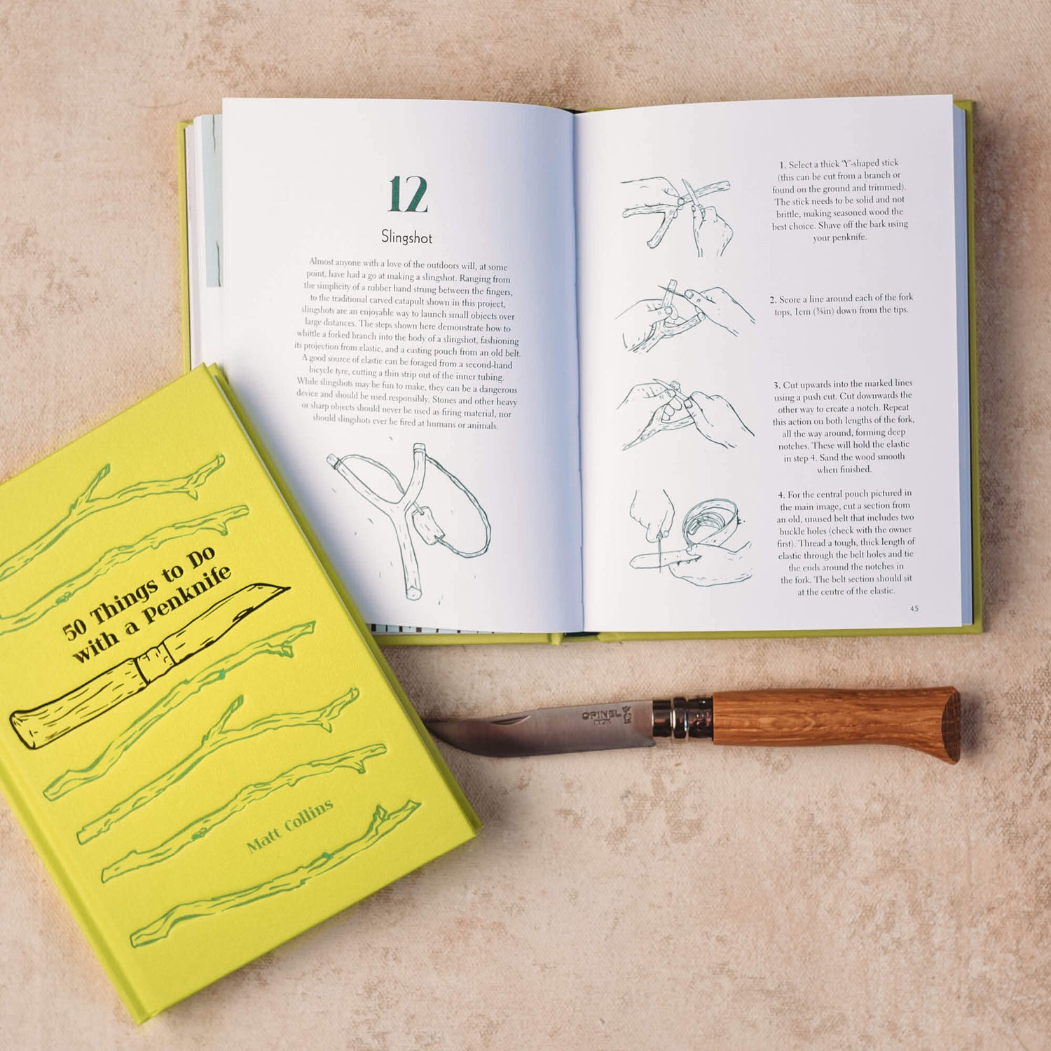 Open page showing how to whittle a slingshot using 50 Things to do with a Penknife book by Matt Collins with advanced No08 wood whittling knife by Opinel, sold by Your Wild Books in a bundle for 13% off
