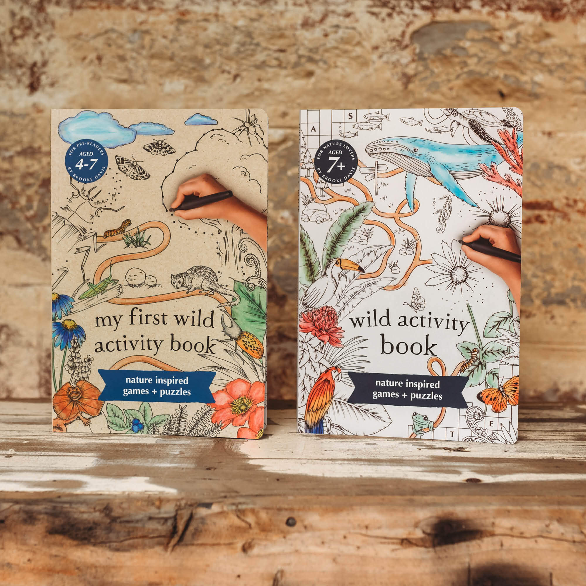 Activity book set for kids, one book is titled My First Wild Activity Book for kids 4-7 years who are learning to read and the other is titled Wild Activity Book and is for kids aged 7+. Both books include nature insprired games and puzzles and are made in Australia.