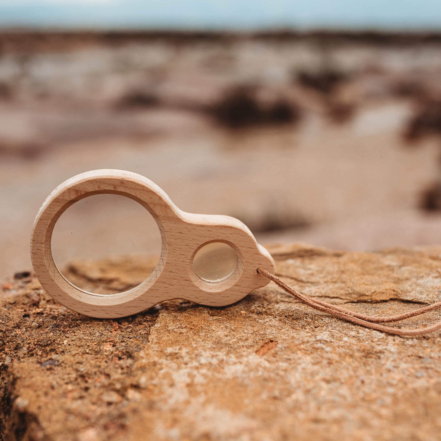 Kikkerland dual magnifier wooden magnifying glass with two lenses for exploring nature and play at the beach  from Your Wild Books