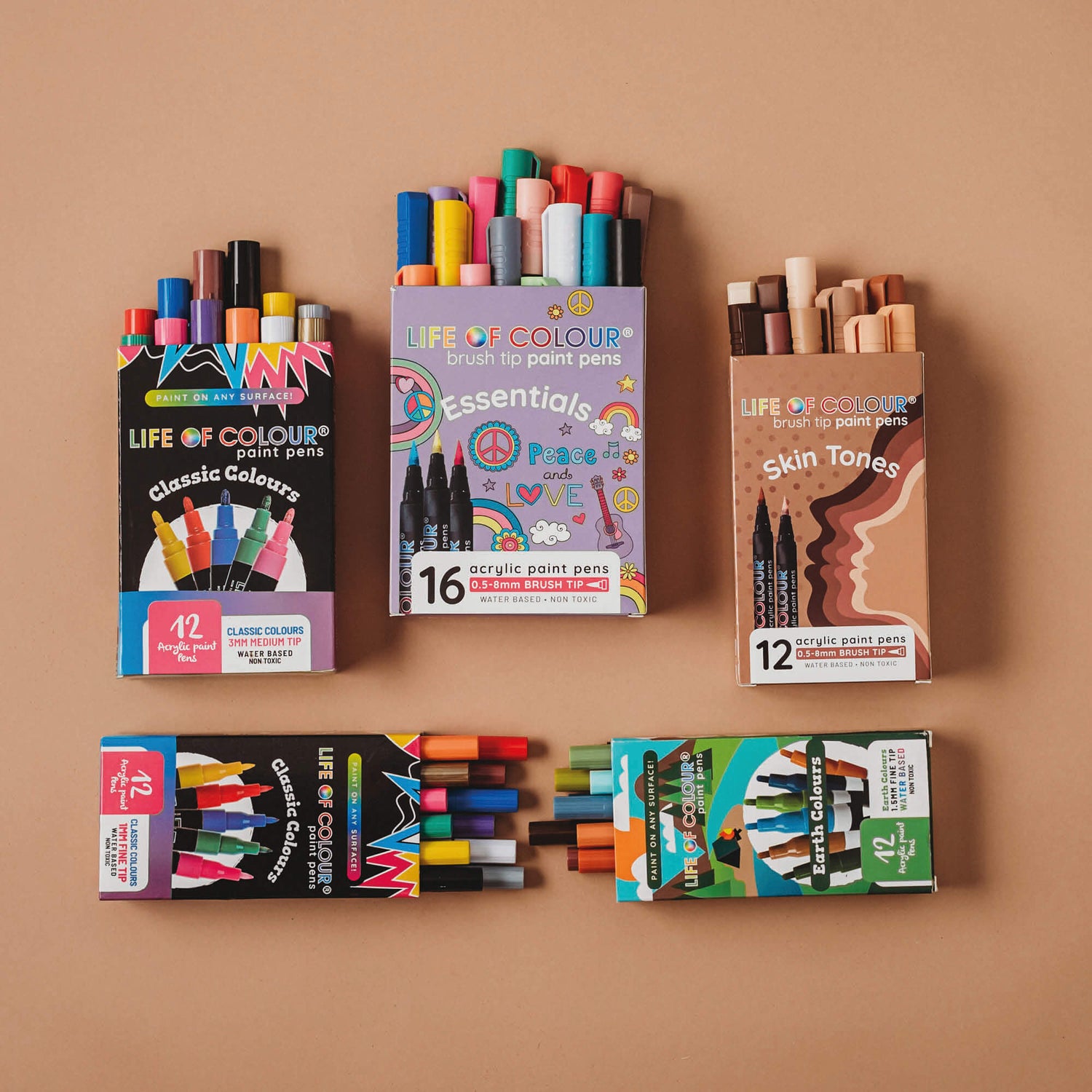 Flat lay of 5 types of Paint Pens. Made by Life of Colour from Your Wild Books