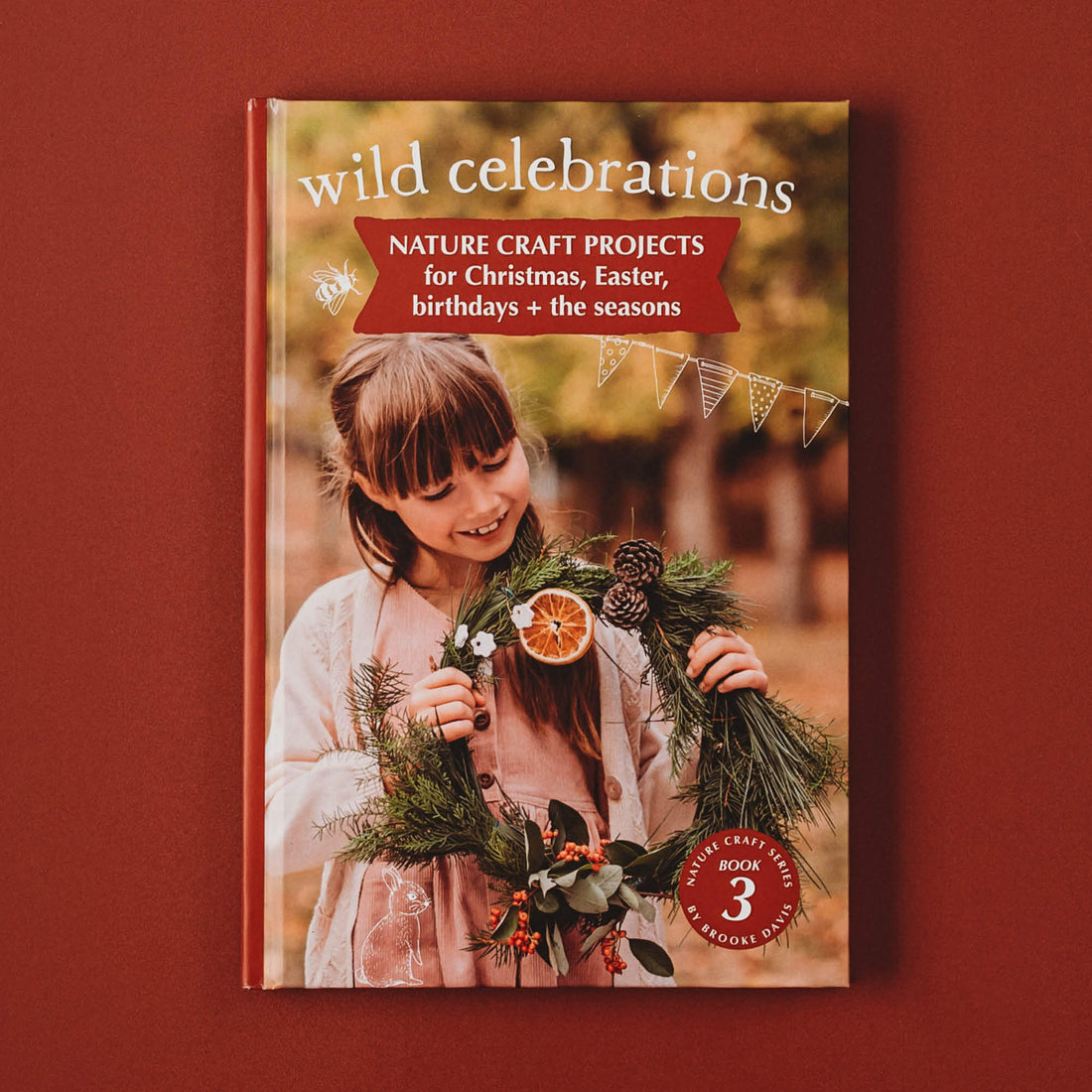 Wild Celebrations book, with nature craft for Christmas, Easter, the Season and birthday parties. Made in Australia by Your Wild Books.