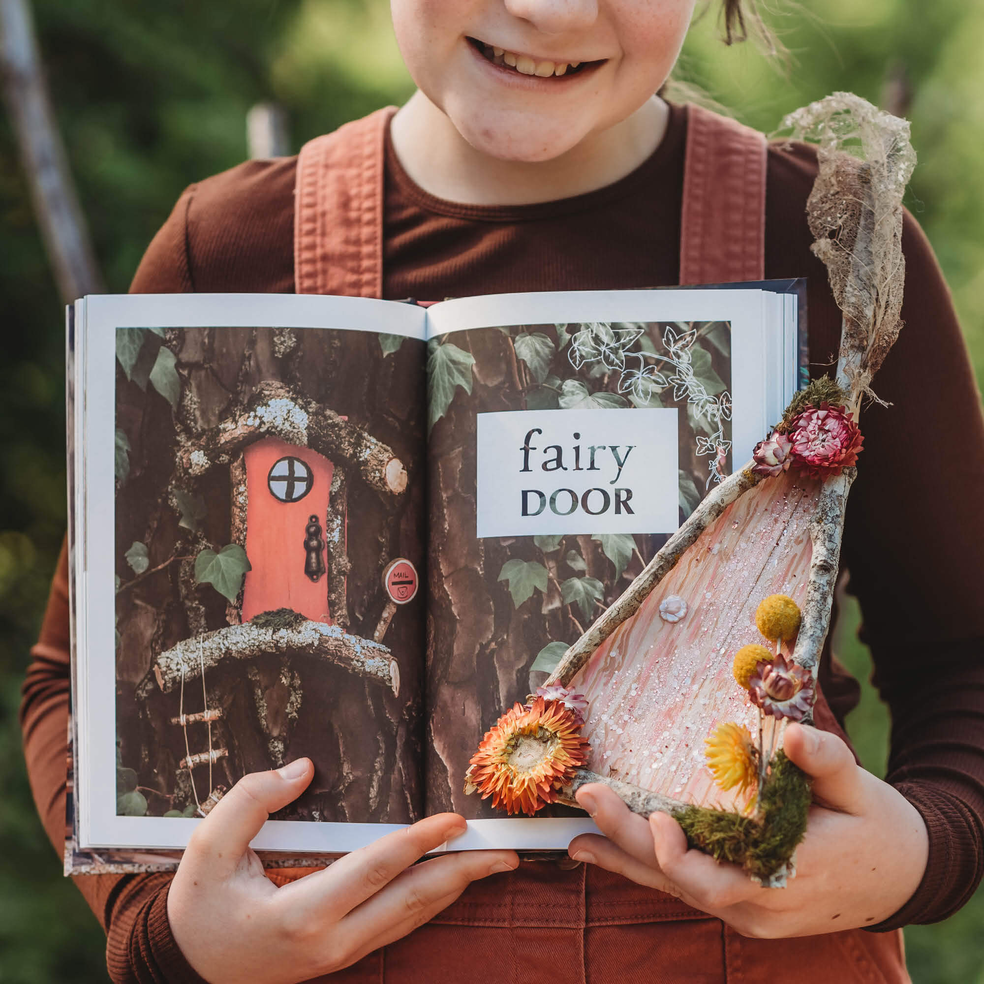 Child holding a fairy door made from nature and Wild Projects for Families book has fun adventures and DIY activities for family outdoor time, is made in Australia by Your Wild Books.